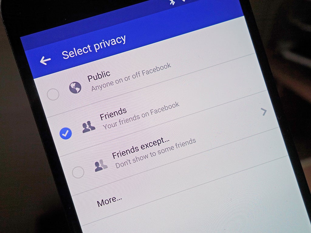 A phone displaying Facebook's privacy options.