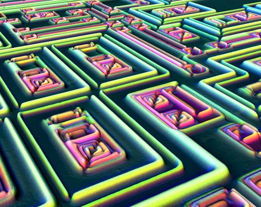 ** Alfred Pasieka of Germany shot this image of a 3d reconstruction of a microchip surface in 500X, using incident light and the Nomarski Interference Contrast**