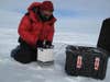 Team scientist Ted Scambos conducts gravity measurements in the area of the Polar Plateau that is believed to overlie subglacial lakes. Although the gravimeters are old (1980s technology), they are very rugged and can measure to about 5 microGals (5 billionths of the Earth's overall gravitational field) when conditions are right.