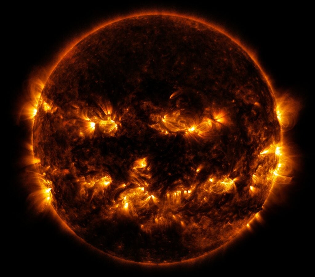 NASA released this October-appropriate image of the sun last week, showing active regions that mimic a Jack-O'-Lantern's toothy grin. It's just a coincidence, but it's nice to see old Sol getting in on the Halloween action.
