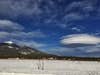 Altocumulus standing lenticular clouds hover in the sky, <a href="https://twitter.com/mark_tarello/status/687833428352307200/photo/1?ref_src=twsrc%5Etfw">spotted from Flagstaff, Arizona</a>. Although this UFO-esque cloud variety is fairly common in mountainous regions, this formation proved particularly beautiful, <a href="https://twitter.com/NWSFlagstaff/status/687799275938447360">lingering in the sky through the afternoon and evening</a>.