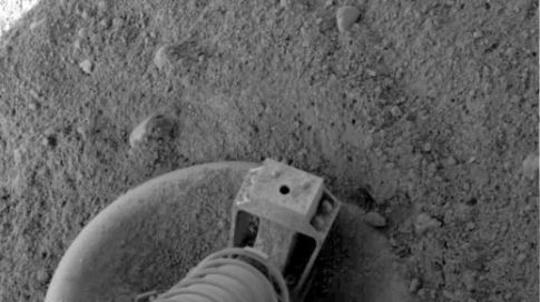 The Phoenix Mars Lander touched down in the north polar region of Mars on May 25, 2008. This close-up photo shows that one of the Lander's three footpads appears to have slid a few inches on touchdown.