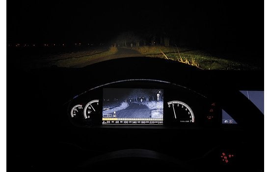 Most automotive night-vision systems, which spot pedestrians and then flash a warning on the car's console, suffer from a metaphorical blind spot: Drivers are safest when looking at the road, not a screen. The Mercedes Spotlight function, part of the optional Night View Assist Plus system, solves the puzzle. A windshield-mounted night-vision camera continuously scans the road up to 260 feet ahead for human shapes. If the computer detects a potential pedestrian, it signals the high beams to flash at the object four times and triggers an alarm to warn a driver of the hazard ahead. Mercedes says the system detects pedestrians 1.3 seconds earlier than a driver can. <em>Jump to the beginning of the <a href="https://www.popsci.com/?image=0">Auto Tech</a> section.</em> <strong>Jump to another Best of What's New category:</strong>