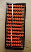 The modern abacus, the counting tool that originated in China in A.D. 1200, awaiting its turn as a prop.