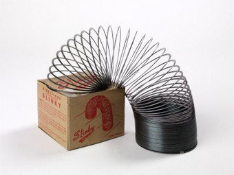 In 1943, Navy engineer Richard James was trying to figure out how to use springs to keep the sensitive instruments aboard ships from rocking themselves to death, when he knocked one of his prototypes over. Instead of crashing to the floor, it gracefully sprang downward, and then righted itself. So pointless—so nimble—so slinky. The spring became a goofy toy of many childhoods—that is before every kid inevitably gets theirs all twisted up and ruins it. 300 million sold worldwide!