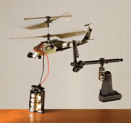 Photographed a Air Battery powering a toy Helicopter and plane and the parts of a battery for Popular Science Gray Matter Febuary issue.