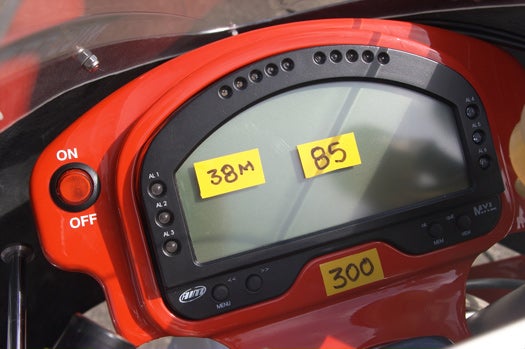 Onboard telemetrics monitor the charge level and the bike's location on track to advise the rider how much throttle he can use and still complete the race.