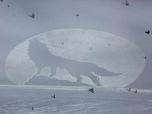 large-scale art created using snowshoes