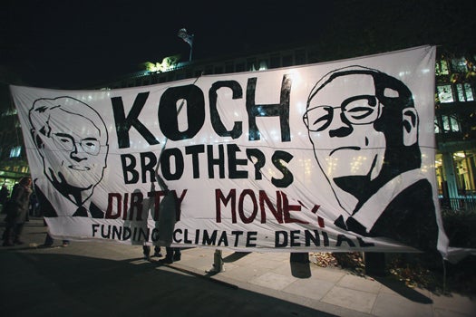 Charles and David Koch on a protester's poster