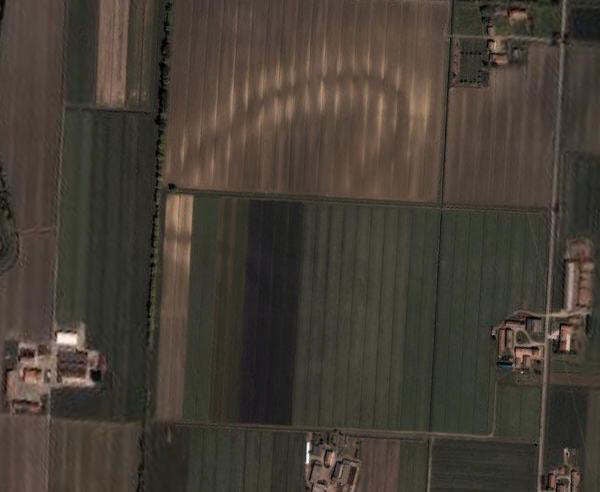 In this case, Google Earth uncovered a surprise practically in a user's own backyard. Italian computer programmer Luca Mori was looking at his neighborhood in Sorbolo, Parma, back in 2005 when he noticed an odd oval shape accompanied by dark rectangular shapes. Local archeologists from Parma's National Archaeological Museum explored the area and turned up an Italian villa that is possibly over 2,000 years old.