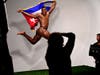 naked athlete jumping with country's flag