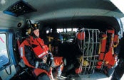 SPECIAL OPS LIFEGUARD<br />
Clad in a dry suit and Trisar harness, rescue swimmers will jump from the helo no matter the temperature or weather. A folding litter hoists injured survivors to safety and the rocket-shaped datum marker buoy keeps tabs on drifting wreckage.