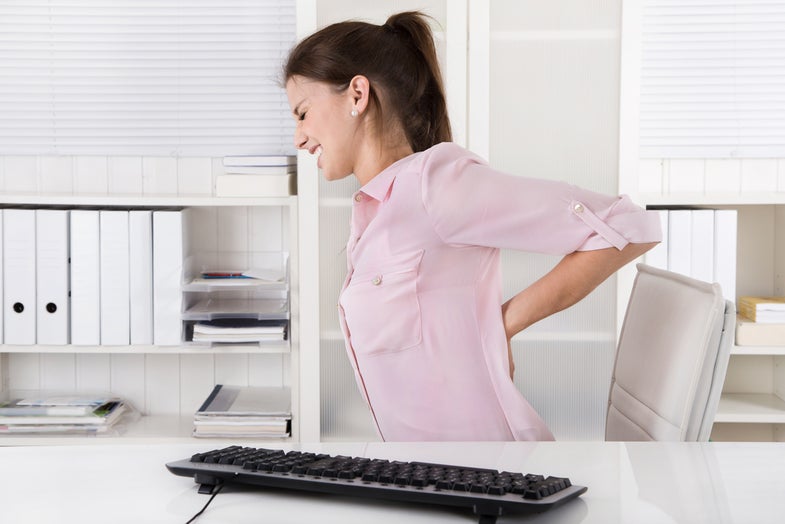woman working with back pain