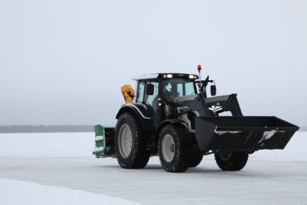 The traktore—the 8 ton tractors that pulled buried cars out of the snowbanks when they veered off the track. The frozen lake had no problem holding these monsters up.