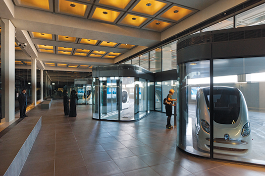 Cars are not allowed in Masdar. The Personal Rapid Transport (PRT) pods travel underground from the city's edge to the Masdar Institute.