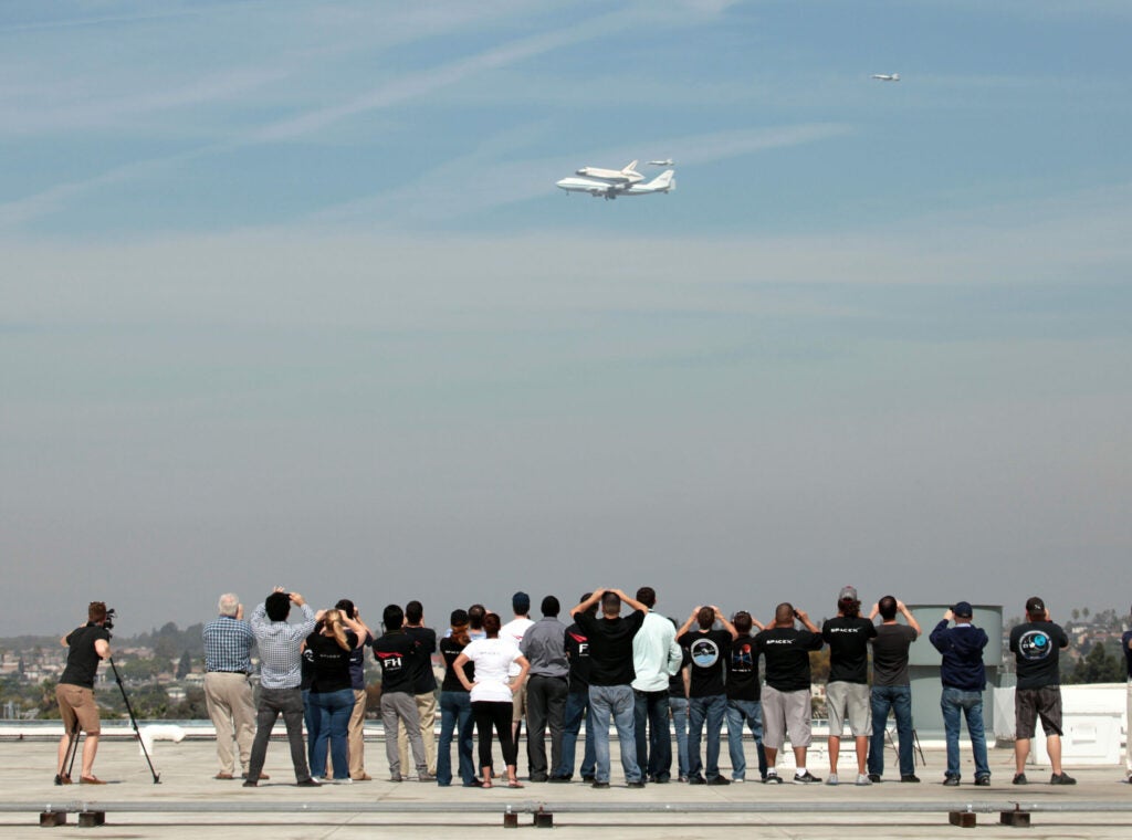 SpaceX team looking at an aircraft