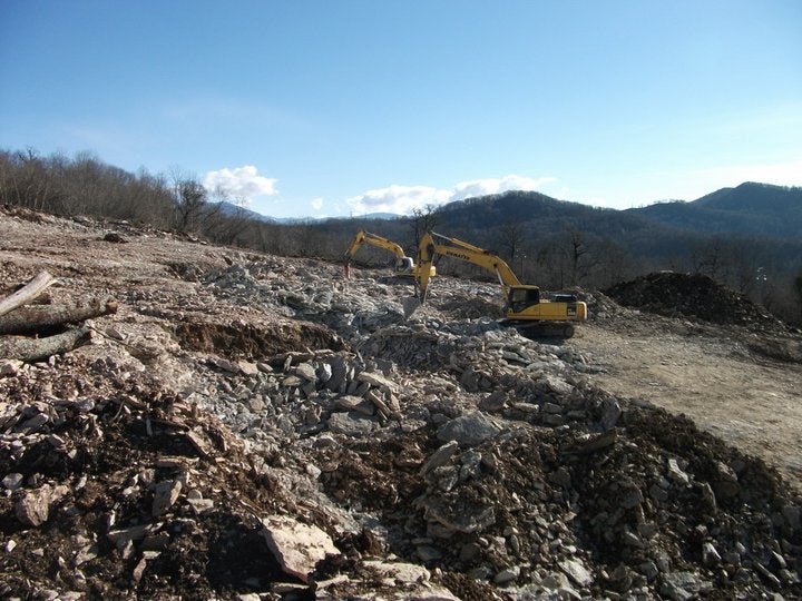 Russian officials promised a "no waste" Olympics, but environmentalists have documented the dumping of untreated construction debris from Olympics building projects. This landfill is near the village of Akhshtyr, outside Sochi.