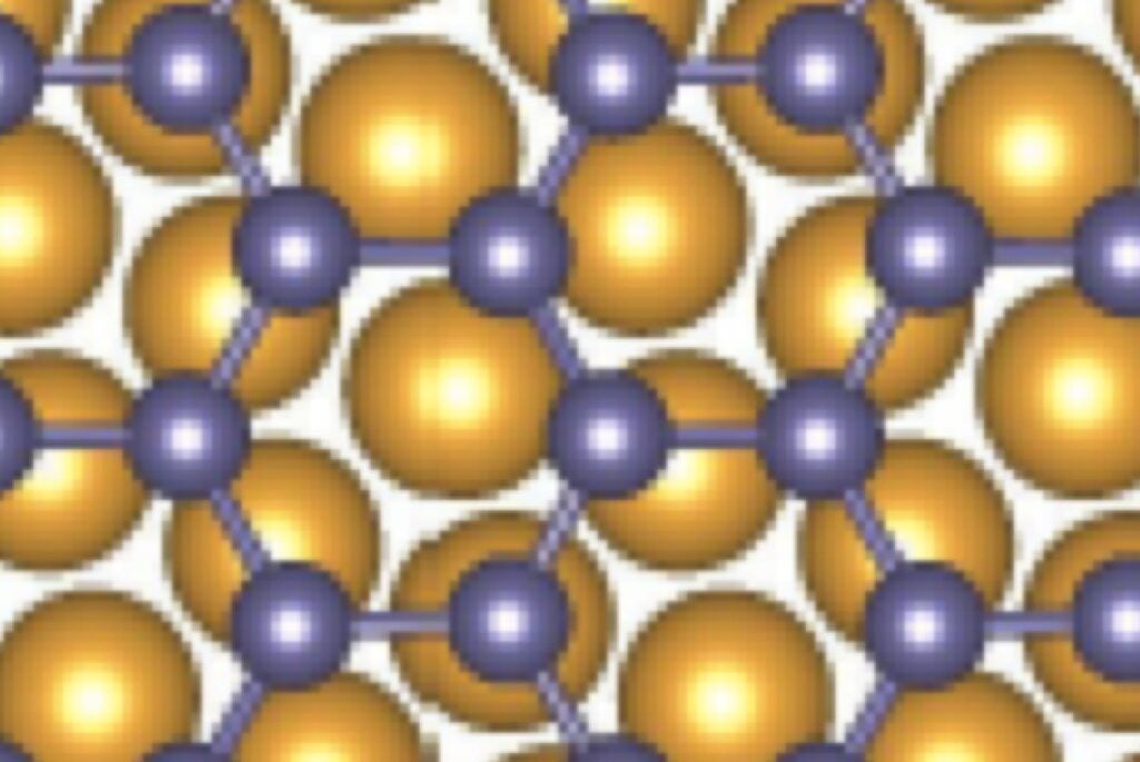 This illustration shows the arrangement of germanium atoms (purple) in germanene. The golden atoms in the background represent germanene's gold substrate.