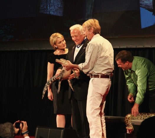By popular request: yes, there were some animals in attendance that didn't get turned into snacks. Here, Buzz Aldrin is handed an adorable alligator.