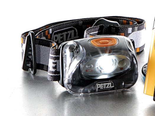 This 2.9-ounce headlamp shines farther than most built-in camera flashes to brighten up nighttime video and stills. Its white LED provides you with as much light as 200 full moons and illuminates the trail as far as 114 feet ahead.<br />
<strong>Petzl Tikka Plus2 $40;</strong> [