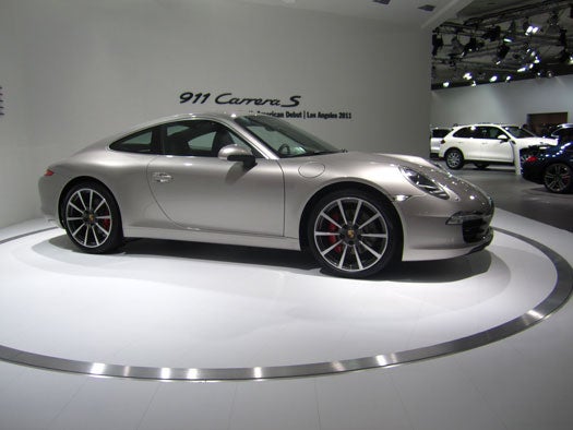 Expect a full review of the 911 soon, but this all-new model – referred to internally as the 991 – is larger, faster and has a lot more power than the previous generation. Lest we forget, the 911 comes equipped with an extra gear, in the form of Porsche's first 7-speed manual transmission. The 911 looks gorgeous, but we expect to see the streets of LA littered with 991s this time next year.