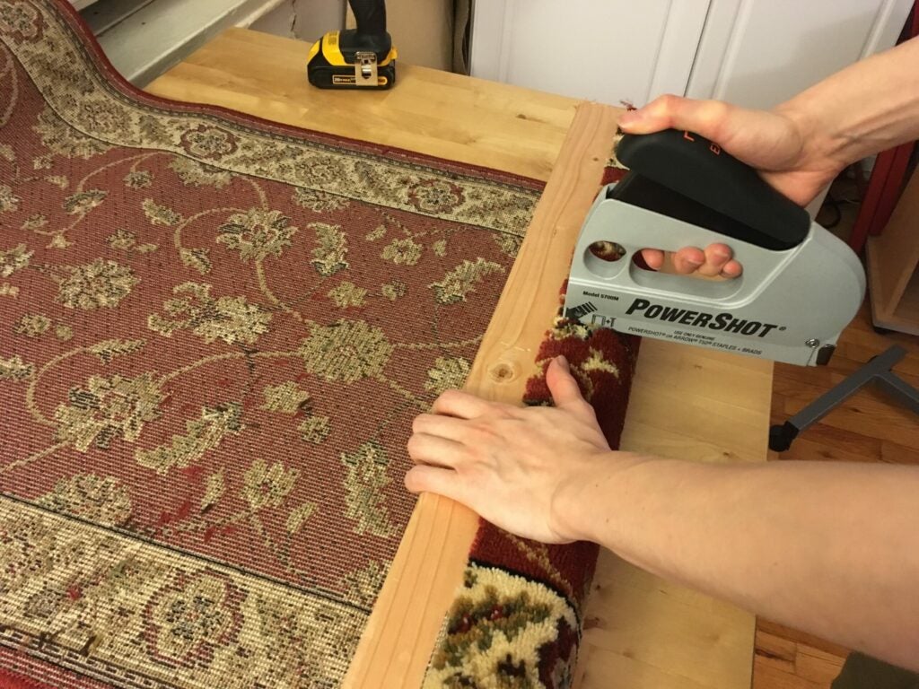 stapling carpet to the post