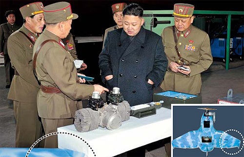 In a picture provided by DPRK propaganda, North Korean leader Kim Jong Un visits a North Korean military unit. The Chosun Ilbo notes that the wing at the bottom left of the picture is similar to that of the SKY-09 UAV, while it appears to be a UAV engine on the table.