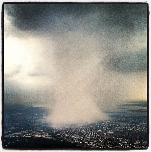 A crazy storm hit New York City this week, showering us all with rain and, oddly, hail. <a href="http://instagram.com/p/NOuYQYgpx4/">This great shot</a>, taken from an airplane, shows it from far away.