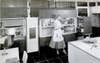 In 1955, General Motors featured another Kitchen of Tomorrow at its Motorama show, and this model contains elements that have yet to become a part of today's kitchens. Most notably, you can open the refrigerator or answer the phone simply by waving your hand around. A tray hanging from the ceiling transports heavy appliances and ingredients. To the far left is the housewife's intercom center, which uses a rotating TV to let her know what's going on in other parts of the house. Read the full story in <a href="http://books.google.com/books?id=NCYDAAAAMBAJ&amp;lpg=RA1-PA44&amp;dq=housewife%20kitchen%20intitle%3APopular%20intitle%3AScience&amp;pg=RA1-PA44#v=onepage&amp;q&amp;f=false">"Dream Kitchen--No Bend, No Stretch--Almost Runs Itself"</a>