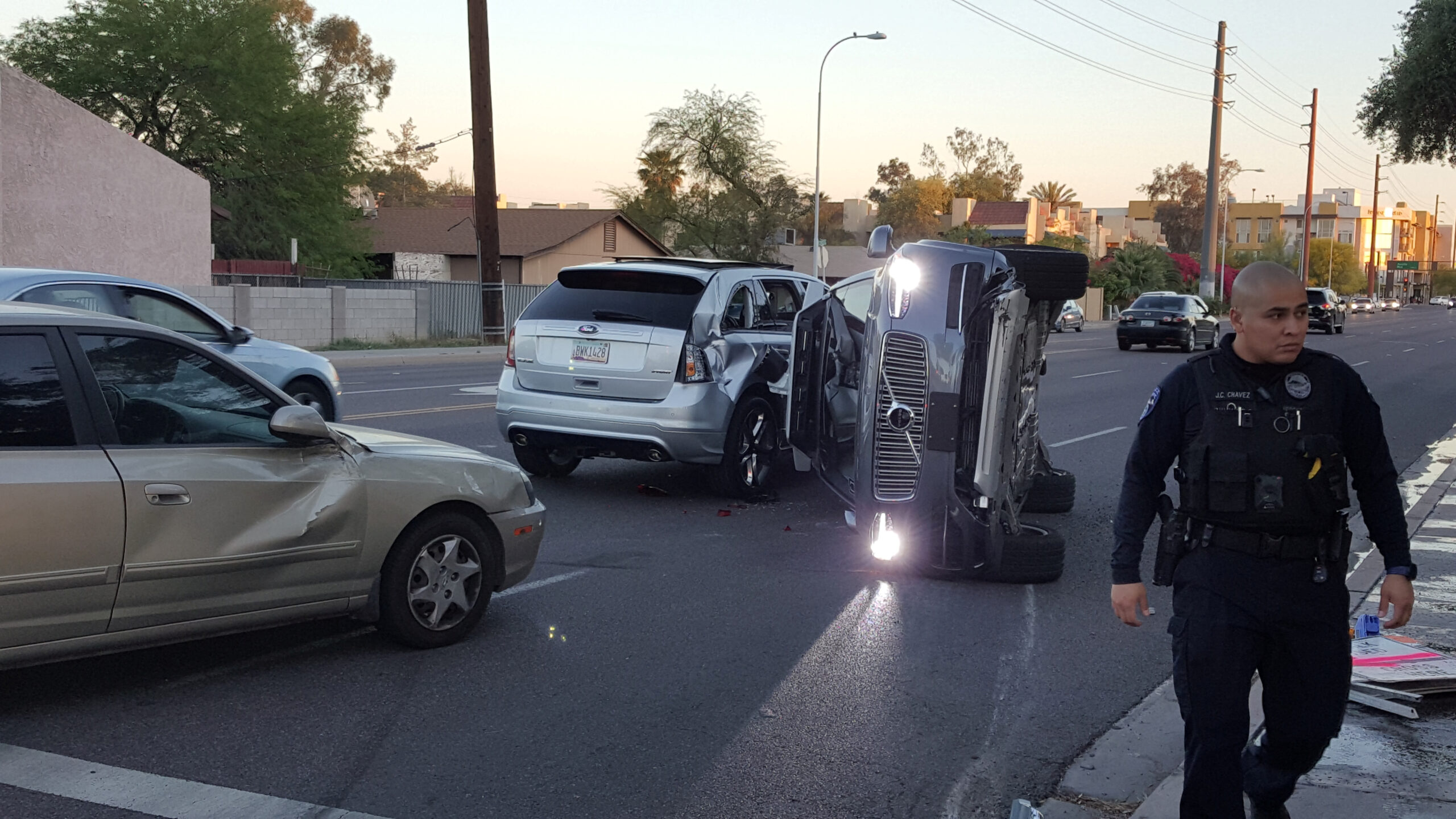A self-driven Volvo SUV owned and operated by Uber Technologies Inc. is flipped on its side after a collision in Tempe, Arizona, U.S. on March 24, 2017. Courtesy FRESCO NEWS/Mark Beach/Handout via REUTERS ATTENTION EDITORS - THIS IMAGE WAS PROVIDED BY A THIRD PARTY. EDITORIAL USE ONLY. MANDATORY CREDIT - RTX32PJX