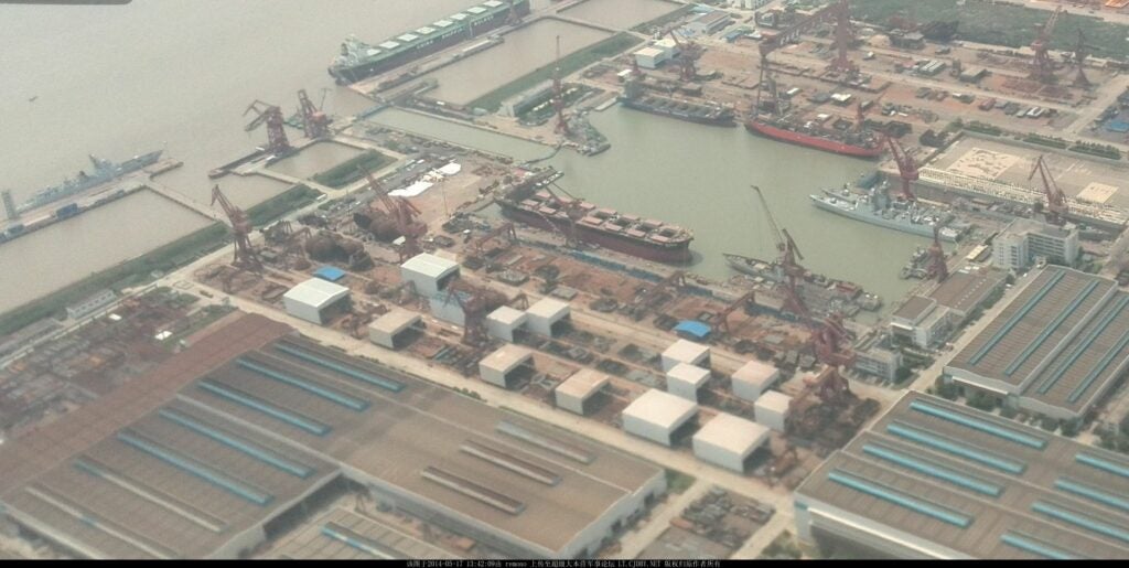 Seen here are three 052D destroyers in the shipyard, as viewed from a commercial airliner.