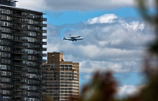 Earlier this morning, the Space Shuttle Enterprise took a farewell glory flight over New York City on its way to its museum resting place. Photos were taken. See more <a href="https://www.popsci.com/technology/article/2012-04/space-shuttle-enterprise-makes-its-final-flight/">here</a>.