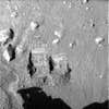 Eleven days after landing, Phoenix's Surface Stereo Imager captured this image of two trenches dug by the Lander's Robotic Arm. Soil and ice samples from trenches dug throughout the mission were analyzed by the Thermal and Evolved Gas Analyzer (TEGA) instrument.