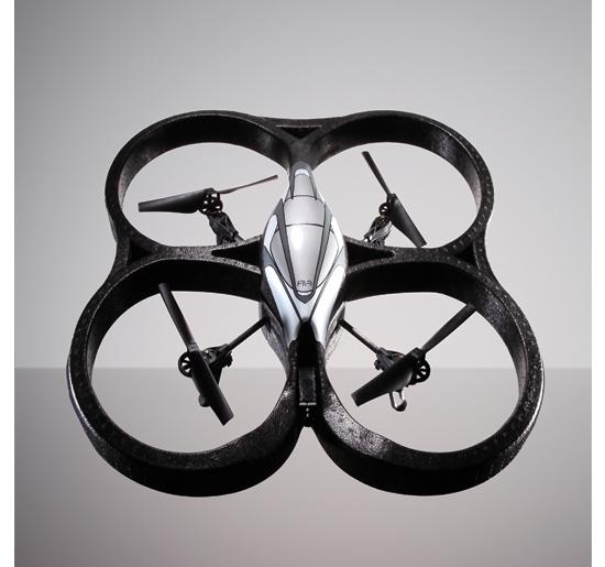 The next generation of remote-control aircraft has arrived. Instead of using a traditional controller, you pilot the Parrot AR.Drone using an iPhone or iPad app over a Wi-Fi network. The aquadricoptera is held aloft by four motor-driven propellers and stabilized by an accelerometer, gyrometers and an ultrasound altimeter. It comes equipped with two video cameras, one on the bottom (which also aids stabilization) and one set to a wide angle at the front, so whatever it sees, you see on the phone or tablet screen. That also lets it double as a flying videogame machine, with a host of augmented-reality (AR) games coming soon. See more at the Best of What's New site. <strong>Jump To:</strong>