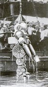 Researchers and engineers at the British Admiralty developed this steampunk-esque "diving armor" to withstand deep-sea pressure. Since the armor restricted the wearer's movements, he had to be hoisted to the surface by a derrick. As a bonus, this particular suit had an artificial claw attached at the arm. Read the full story in "In the Grip of the Deep"