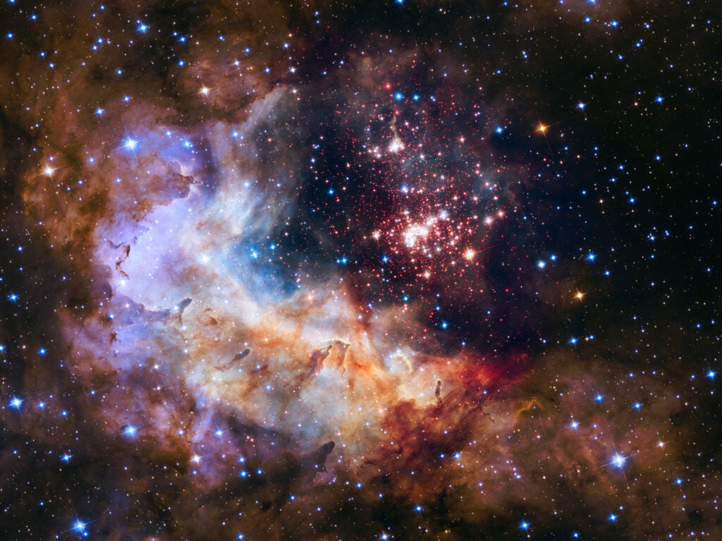 Stars and gas shining bright, in space