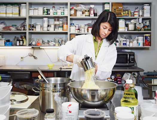Food scientist Candice Lin pushes potatoes through a ricer before sterilizing at 250°F.