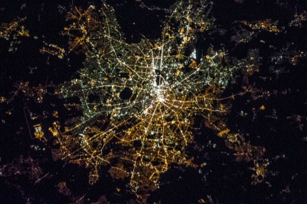 satellite photo showing white and orange lights in Berlin at night