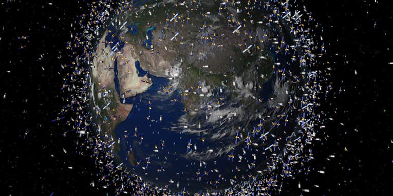 New Plan To Remove Orbiting Space Debris: A Giant Harpoon