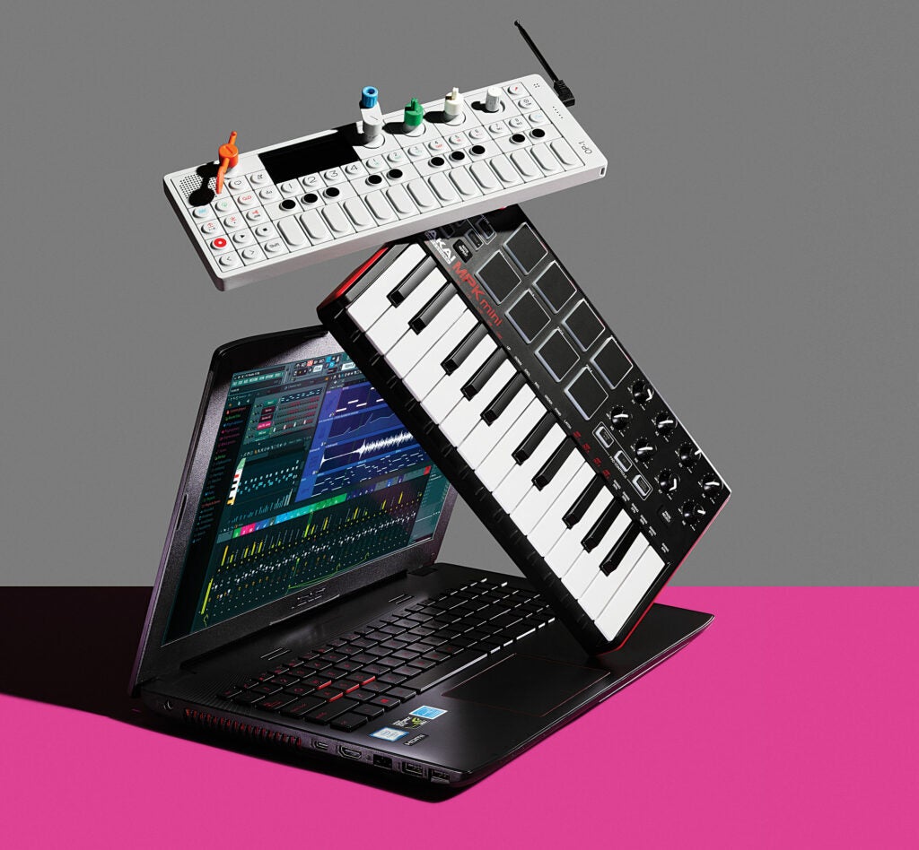 From top, the Teenage Engineering OP-1, Akai MPK Mini, and the Asus Republic of Gamers laptop are all pieces of Hudson Mohawke's mobile studio.