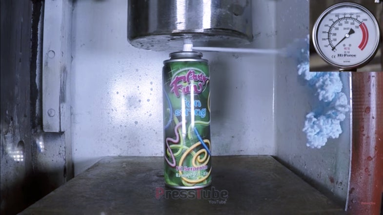 Watch A Hydraulic Press Crush A Can Of Silly String