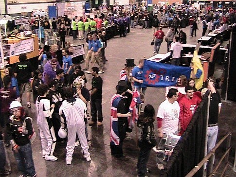 A crowd of students and robots at the 2009 FIRST Robotics Competition in New York City.