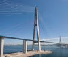 The world's longest cable-stayed bridge connects the Russian port city of Vladivostok to Russky Island with a main span of 3,622 feet. The bridge's 1,053-foot-tall A-shaped towers (the world's tallest) rest on 253-foot-deep piles; its 1,902-foot cable stays (the world's longest) are clad in UV protective housings.
