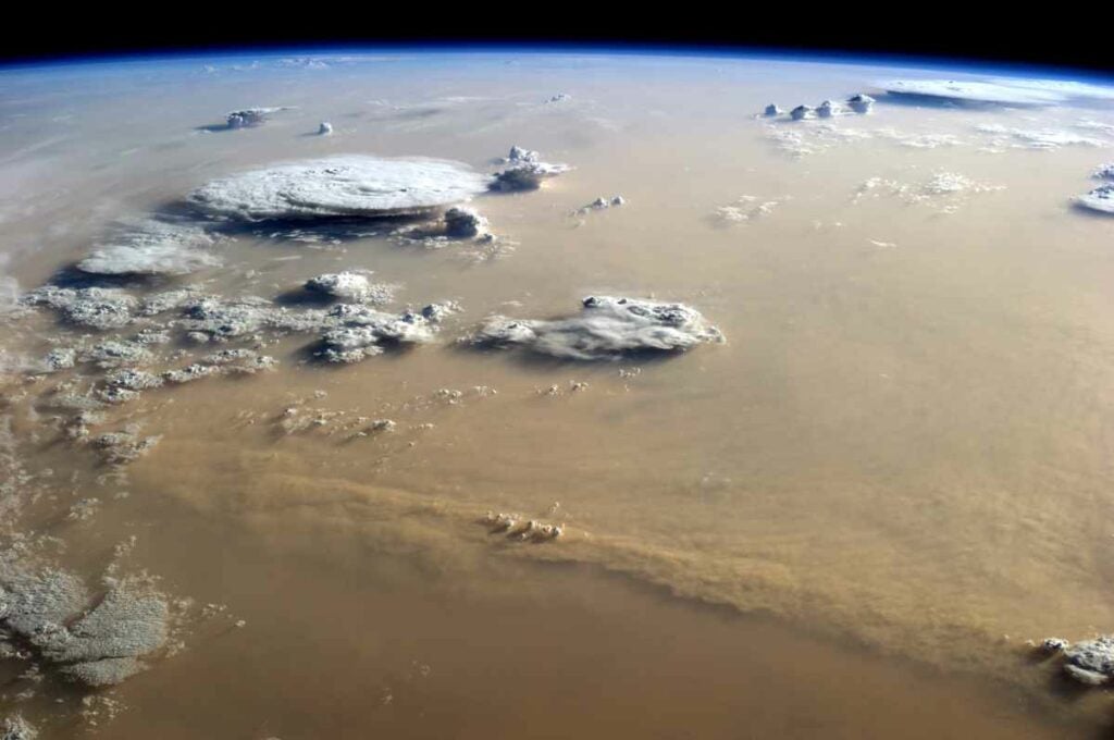 Astronaut Alex Gerst <a href="http://earthobservatory.nasa.gov/IOTD/view.php?id=84400&amp;src=eoa-iotd">shot this image</a> of a dust storm rolling over the Sahara from the International Space Station. Saharan can block or reflect sunlight, leading to changes in cloud formation. This can actually influence Atlantic water and soil in the Americas. <a href="https://www.popsci.com/article/science/enormous-butterfly-swarms-saharan-duststorms-and-other-amazing-images-week/"><em>From September 26, 2014</em></a>