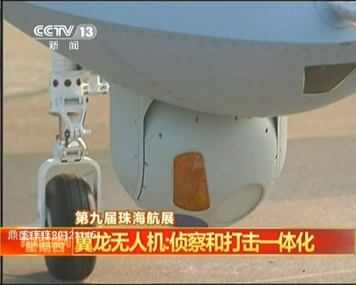 This close up of a CCTV 13 news broadcast shows the Pterodactyl's sensors, including the white circular electro-optical camera, as well as a laser rangefinder/designator and an infrared or night vision camera.