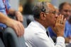 NASA Administrator Charles Bolden waits as Curiosity descends to the surface of Mars, a moment known as the <a href="https://www.popsci.com/technology/article/2012-06/video-curiosity-mars-rovers-landing-seven-minutes-terror/">"seven minutes of terror."</a>
