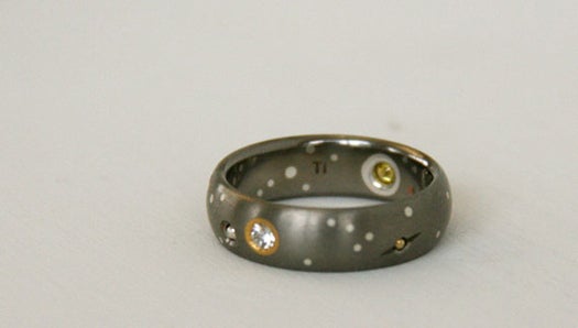 <a href="http://patrickburt.etsy.com/">Patrick Burt</a> won the 3-Dimensional Original category with his creation, <em>Brother Sun, Sister Moon</em> - a titanium ring embedded with tiny diamonds, gold and silver pieces that represent different bodies in our solar system.