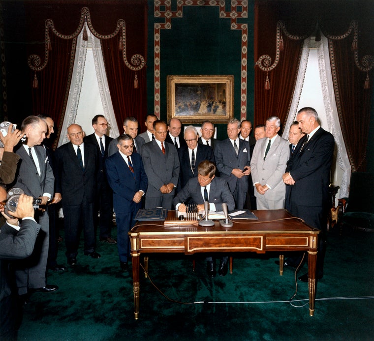 President Kennedy signing the Limited Test Ban Treaty in 1963