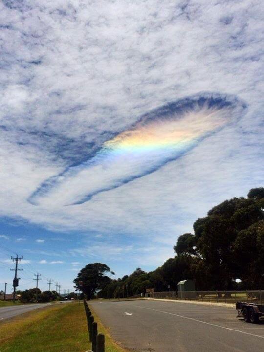 A local Australian radio station <a href="https://twitter.com/StarFMGippsland/status/529176778657390592/photo/1">tweeted</a> this gorgeous cloud formation Monday, asking listeners, "Did you see the weird rainbow thing in the sky over Wonthaggi?" Discovery <a href="http://news.discovery.com/earth/weather-extreme-events/rare-fallstreak-hole-appears-over-australia-photos-141104.htm">reports</a> that the weird rainbow thing is in fact something called a "fallstreak hole". Here's how the NOAA describes the weather event: &gt;These 'supercooled' water droplets need a 'reason' to freeze, which usually comes in the form of ice crystals. Planes passing through the cloud layer can bring these ice crystals. Once the ice crystals are introduced, the water droplets quickly freeze, grow and start to fall. A hole is left behind, which will start to expand outward as neighboring droplets start to freeze. We think "fallstreak" is a pretty great name for the gorgeous phenomenon.