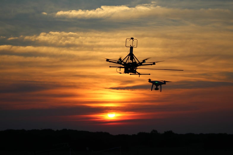 Drones flying toward the sun